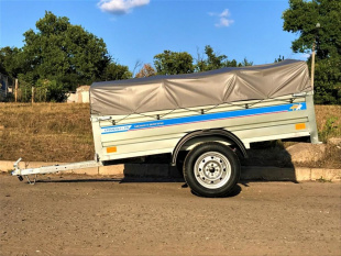 Автомобильный оцинкованный прицеп Кремень "Профи Премиум" (2,3х1,3) на рессоре Волга