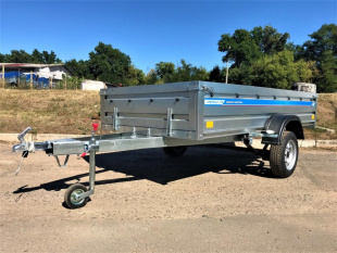 Самосвальный оцинкованный прицеп Кремень "Бизнес Люкс" (3,0х1,6) на рессоре alko