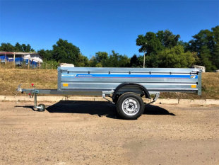 Самосвальный оцинкованный прицеп Кремень "Бизнес Люкс" (3,0х1,6) на рессоре alko